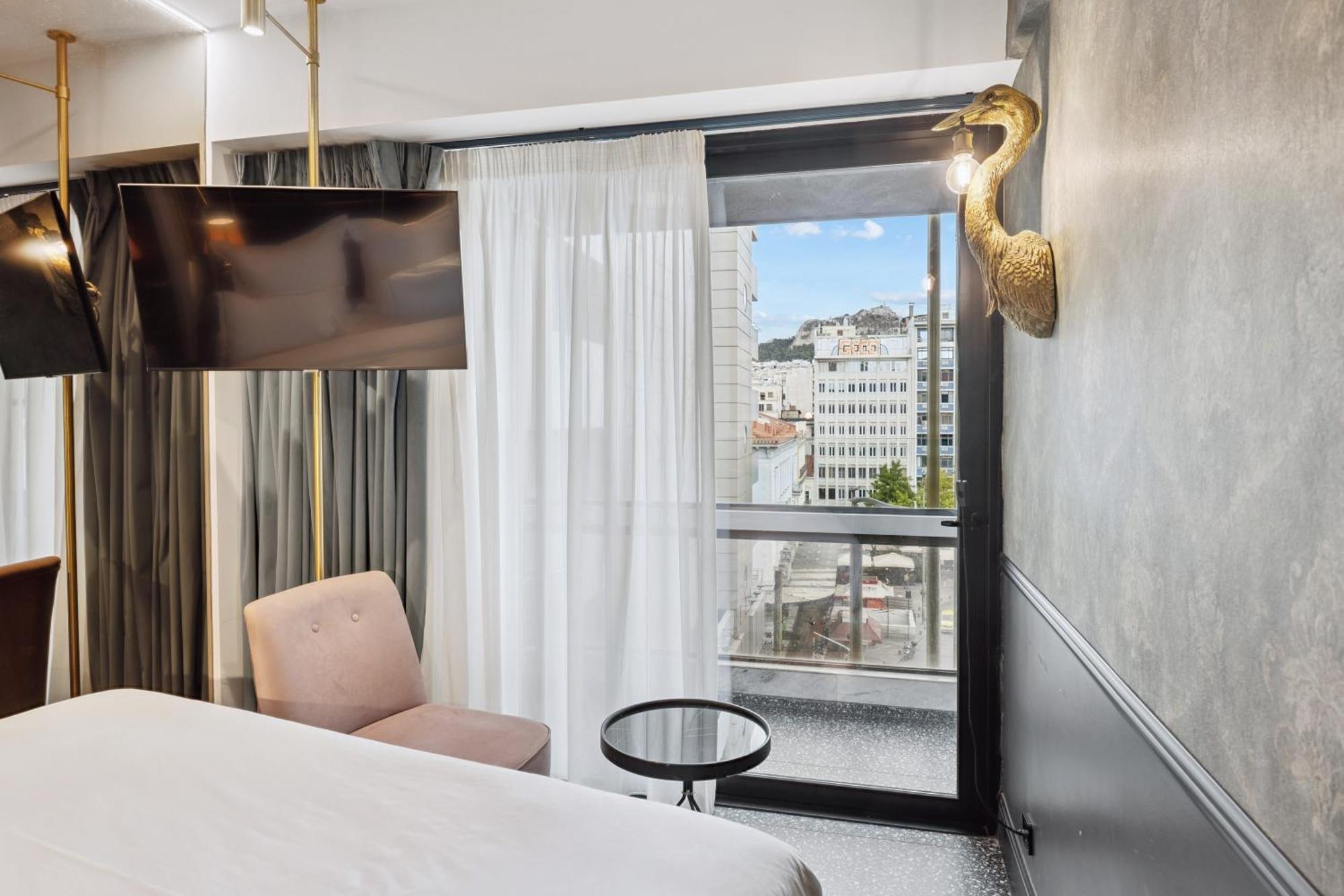 Savvy Room with Balcony & City View